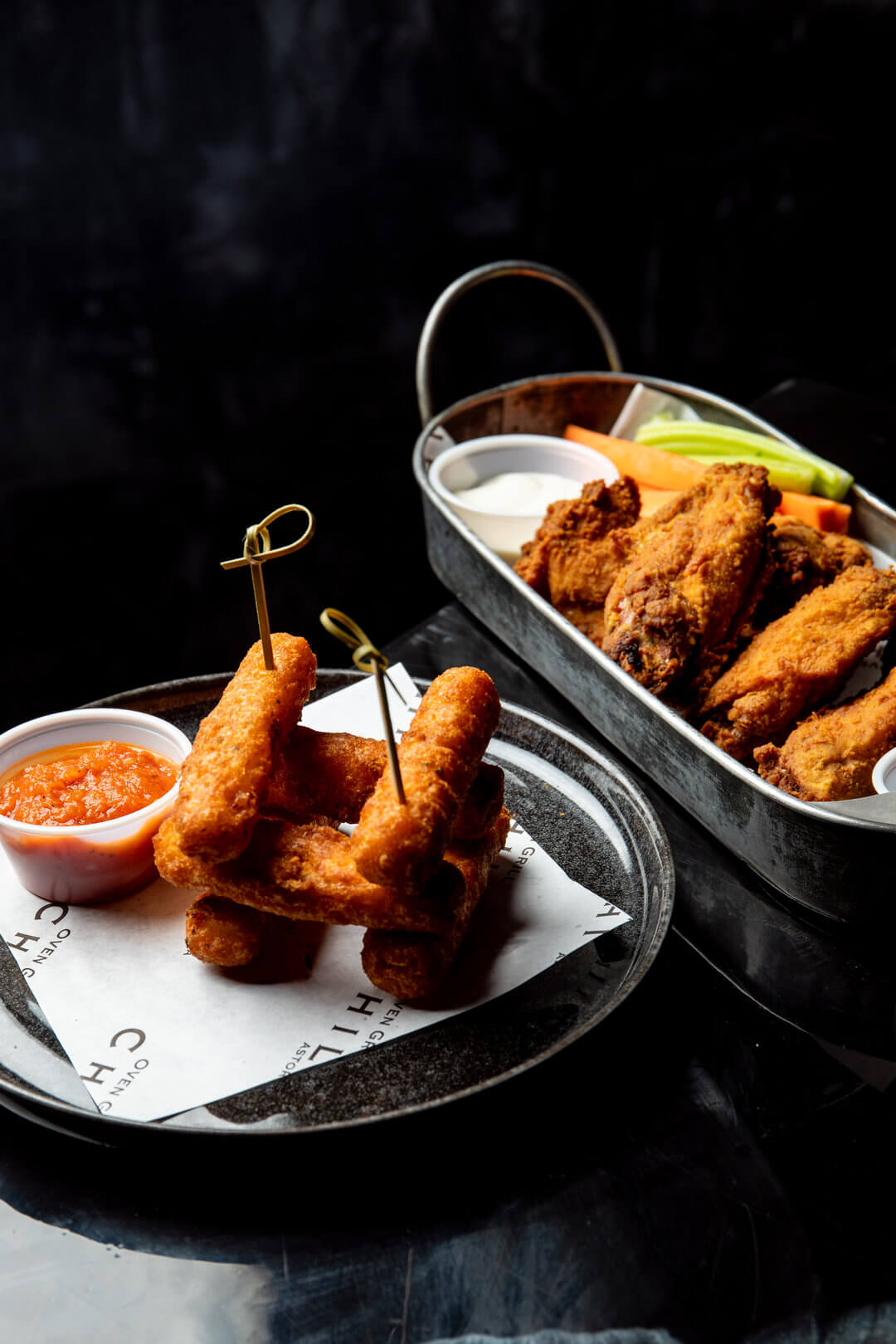 Mozzarella sticks and wings — bar food Astoria New York