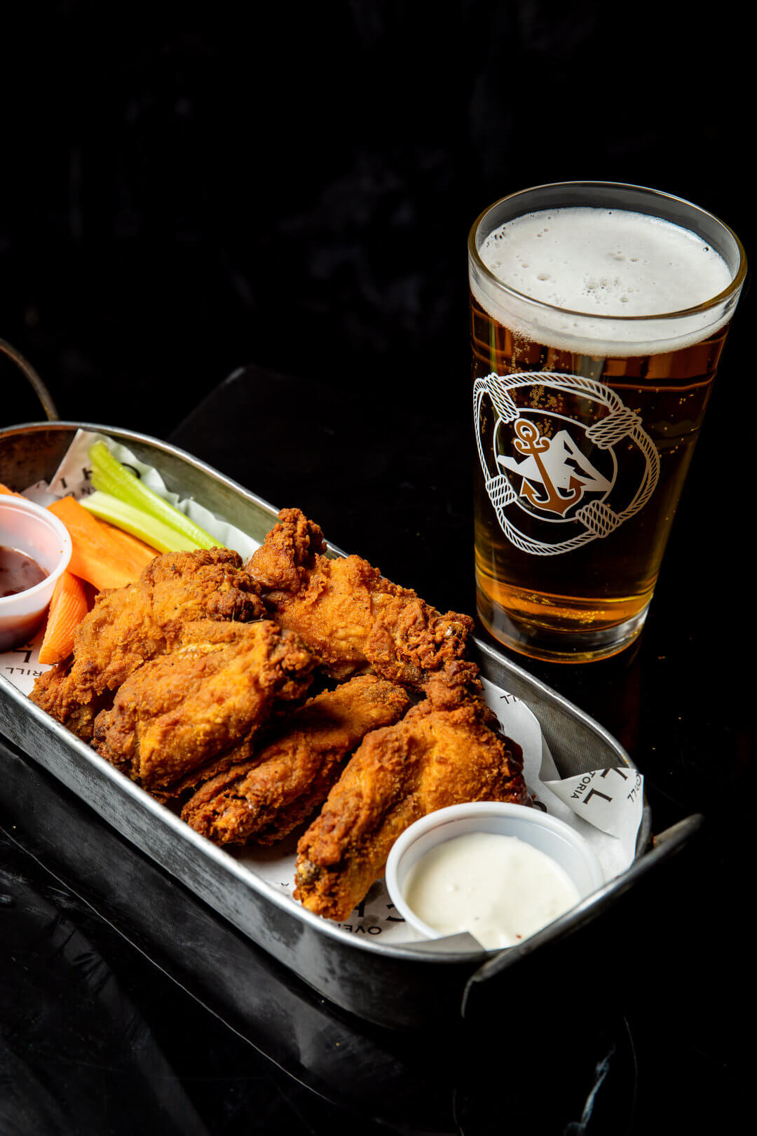 Wings and beer at Chill Astoria sports bar Astoria